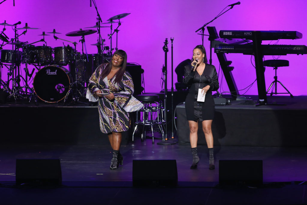 BROOKLYN, NY - SEPTEMBER 15: Loni Love (L) and La La Anthony speak onstage during Finding Ashley Stewart 2018 at Kings Theatre on September 15, 2018 in Brooklyn, New York. (Photo by Bennett Raglin/Getty Images for Ashley Stewart)